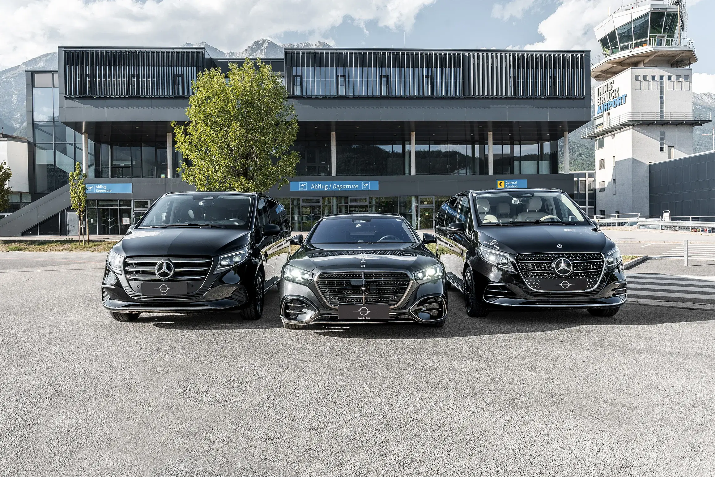 Space Taxi's Vito, S-Class and V-Class side by side in front of Innsbruck Airport